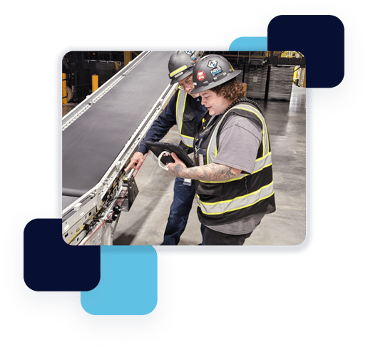 Fidus service tech performing diagnostics in warehouse